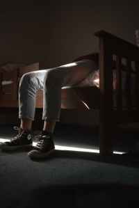 pair of black and white converse all star and gray denim jeans